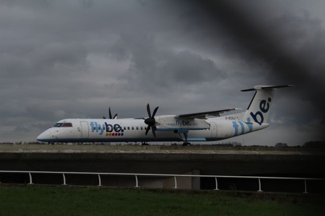 G-ECOJ — - Dash 8 turboprop, FlyBe, taxiing to the runway Polderbaan at Schiphol Amsterdam Airport (Holland).