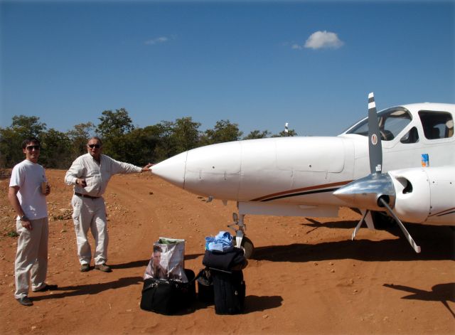 Cessna Chancellor (ZS-LTY) - At a sand strip in South Africa. John and Simon Fourie.