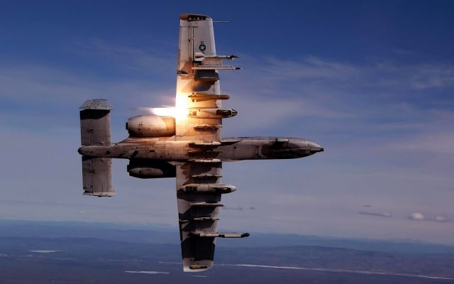 — — - A Fairchild A-10 in action