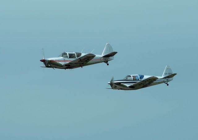 TEMCO Swift (C-FHKV) - In formation with CF-GDS at the 2013 Vintage Wings of Canada Air-show edition.