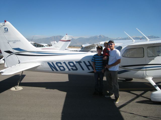 Cessna Skyhawk (N619TH) - Future Pilots w/ Dad alongside their Cessna w/ Utah Wasatch Front in background.