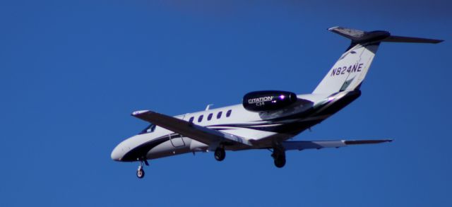Cessna Citation CJ4 (N824NE) - About to touch down is this 2024 Cessna 525C Citation CJ4 from late Winter 2024.