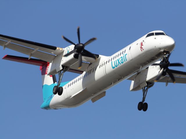 LX-LGD — - Luxair Dash 8 Q400 on short finals to London City Airport.