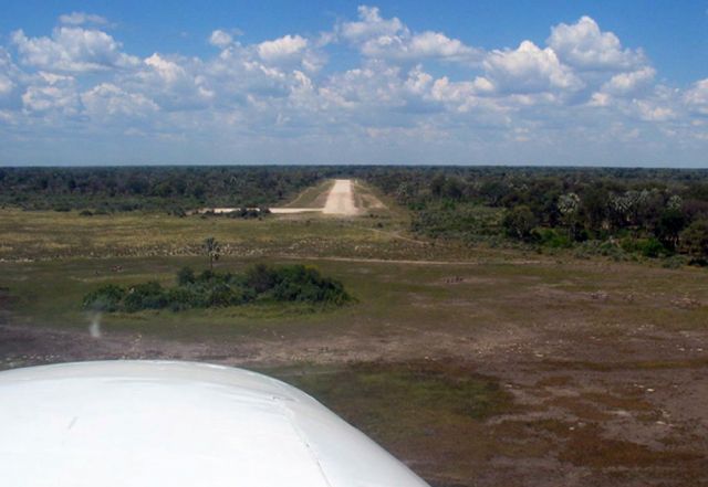 Cessna 402 (ZS-MPC) - Aproaching Hunda airstrip in the Okavango Delta, Botswana. Low approach speed is essential.