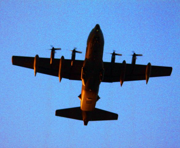 Lockheed C-130 Hercules — - USAF C130 ... "Night Ops"  Touch and Go at SJC   06-04-2013  Sunset reflecting off of aircraft