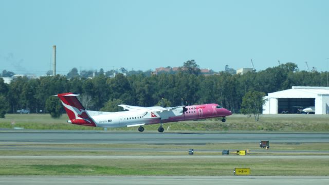 de Havilland Dash 8-400 (VH-QOH) - 6th August 2015: Dash 8 takes off at Brisbane airport.