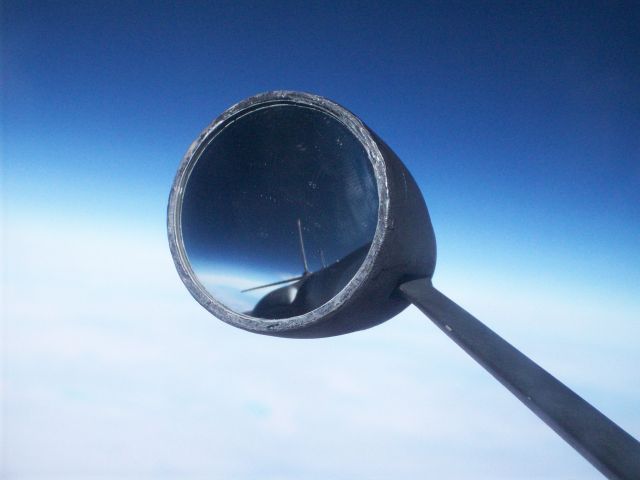 Lockheed ER-2 — - Over California climbing to altitude--  A view of the tail through the side mirror built to check for contrails