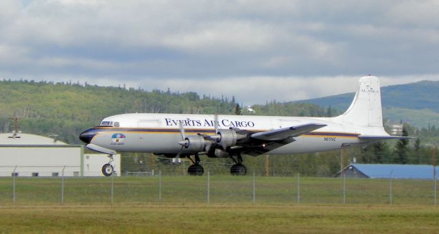 Douglas DC-6 — - Chuck accelerating down the runway.