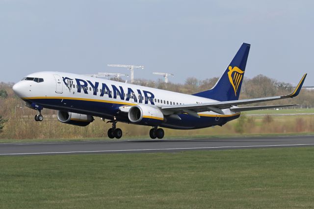 Boeing 737-800 (EI-DCW) - RYR3246 off to Stuttgart.  The cranes in the background are for the work expanding T2 at Manchester, due to open in the year 2020.