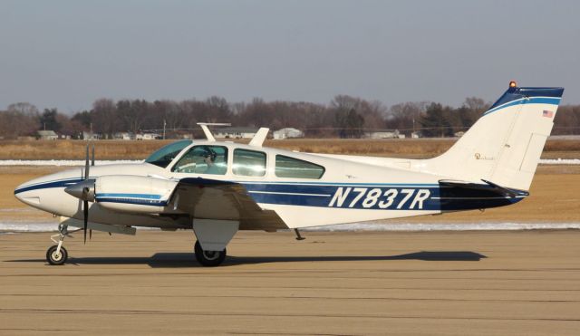 Beechcraft 55 Baron (N7837R) - Whiteside Co. Airport 26 Feb 2022br /This guy stopped thru for fuel on his way from South Florida to the Minneapolis area.br /Gary C. Orlando Photo