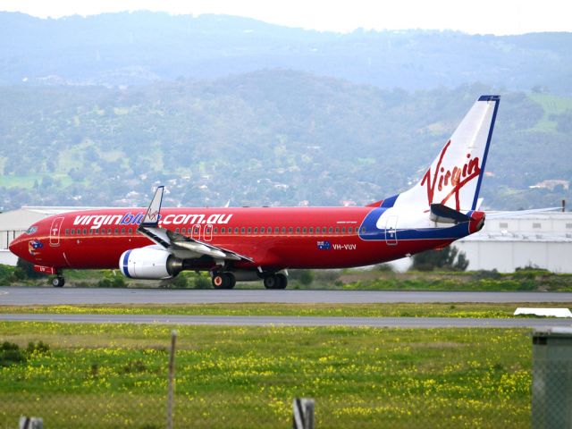 Boeing 737-800 (VH-VUV) - Rolling for take off on runway 05. Thursday 12th July 2012.