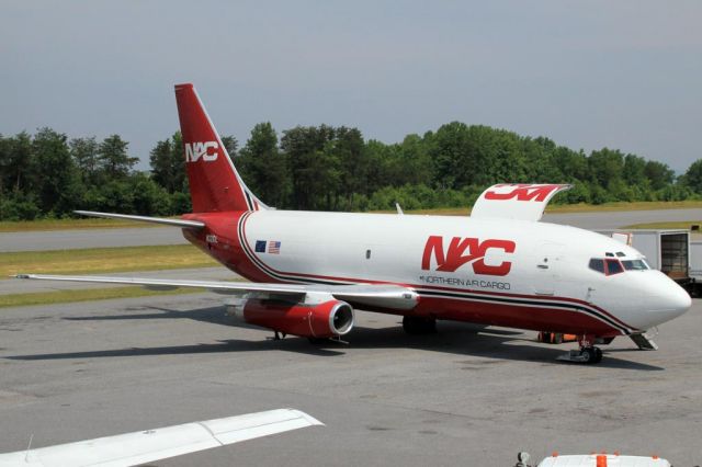 Boeing 737-200 (N321DL) - NAC861/NAC321  Northern Air Cargo Boeing 737-200 on the ramp offloading cargo in Hickory, NC.