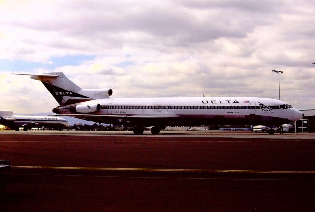 BOEING 727-200 (N485DA) - KSJC - Kodak Instamatic photo on color slide film - taken 1976 towards the old Terminal C - south end. There was an old car rental lot back then that if I drove in and took a few photos then left nobody seemed to care but it was posted no trespassing. Gulp!