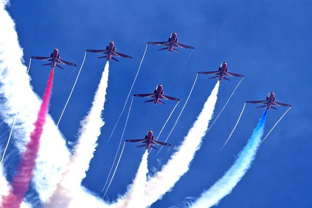 — — - Red Arrows shown at their best during RAF Battle of Britain Display Jersey Channel Islands UK Sept 2012