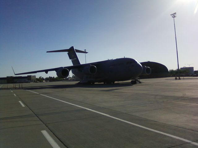 Boeing Globemaster III — - Sitting on the South Ramp at KIWA while unloading 4 Hueys that are to be completely rebuilt.