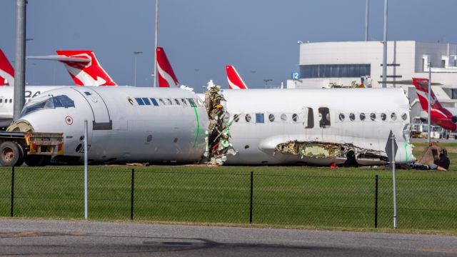 Fokker 100 (HB-JVF) - EX Helvetic Airways Fokker 100 HB-JVF seen here being scrapped. The aircraft was used as a source of spare parts for other F100 operators. Unfortunately this isn't the best photo as it has pole obstructions and I had to photograph through a fence. 