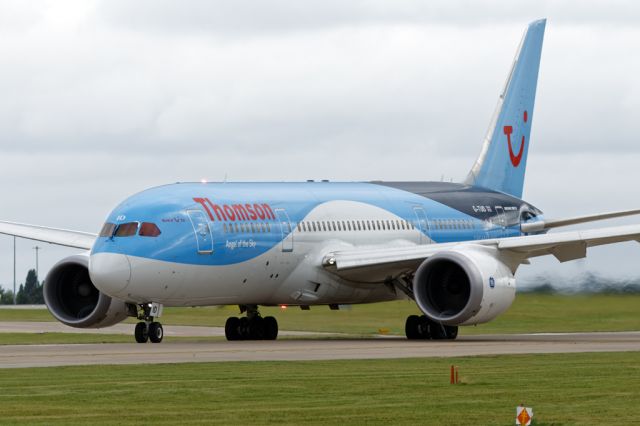 Boeing 787-8 (G-TUID) - The high suction as the engine spools up generates a vortex shown by trails entering the port and starboard intakes - 2 trails on the starboard side.  TOM174 departs to Cancun