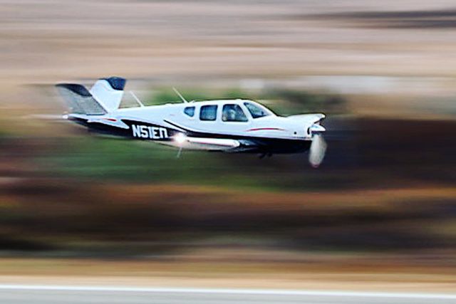 Beechcraft 35 Bonanza (N51ED) - Just passing through! 