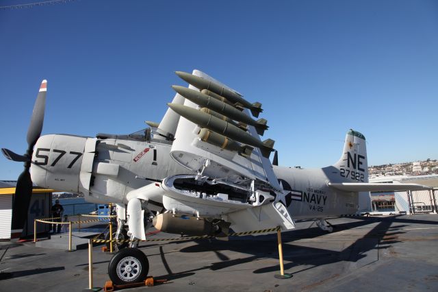 Douglas AD Skyraider — - A-1 Skyraider NE 27922 on USS Midway San Diego November 2014