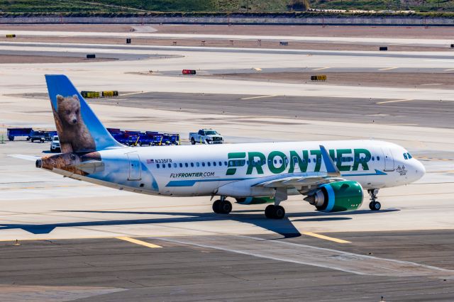 Airbus A320neo (N335FR) - A Frontier Airlines A320 neo "JoJo the Grizzly Bear"  taxiing at PHX on 2/10/23 during the Super Bowl rush. Taken with a Canon R7 and Tamron 70-200 G2 lens.