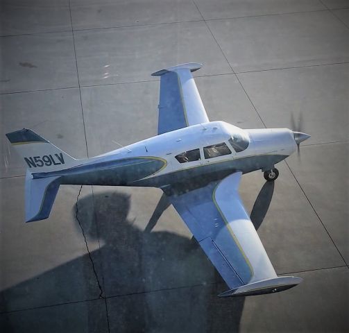 Piper PA-24 Comanche (N59LV) - From the third story window.