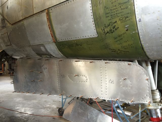 Douglas A-26 Invader (N4988N) - Fitting nose gear doors with new skins. Special Kay, On Mark Counter Invader B26-K 64-17679. We are approaching return to flight. Check us out on Warbird Information Exchange. Signatures are all former crew who operated or maintained the A26 in SEA  #specialkayjr