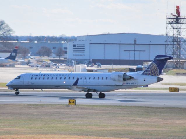 Canadair Regional Jet CRJ-700 (N173GJ) - Crossing runway 36C for Concourse A - 12/10/14