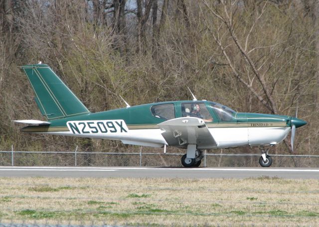 Socata TB-20 Trinidad (N2509X) - Starting to roll down runway 14 at the Shreveport Downtown airport.