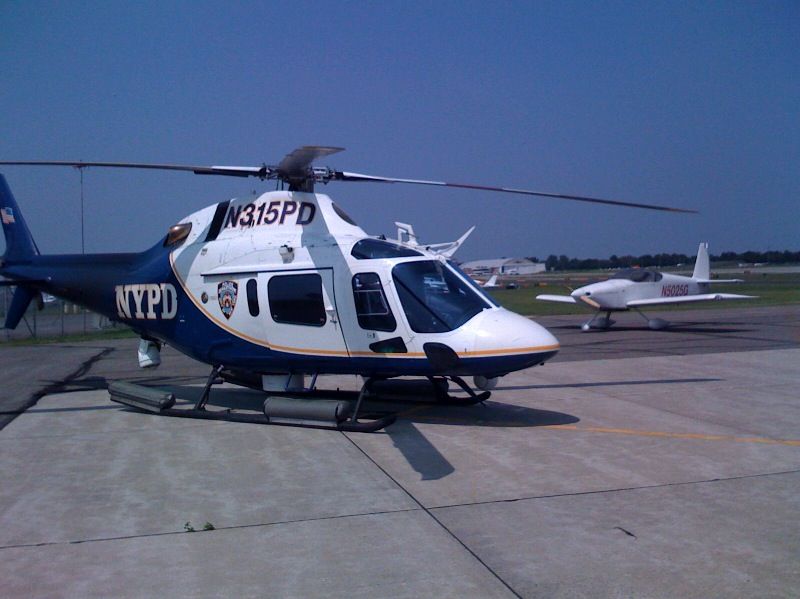 N5025G — - N5025G busted the NY class bravo and was escorted to KFRG by the NYPD helicopter seen next to it.