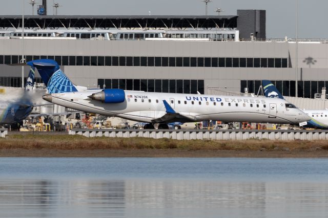 Canadair Regional Jet CRJ-700 (N743SK) - 16th November, 2024:  Racing up runway 01R for takeoff.