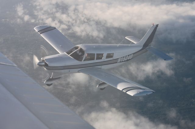 Piper Saratoga (N15240) - Off wing N31699 taken by S. Peterson