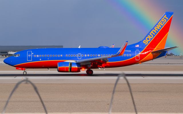 Boeing 737-700 (N7703A) - Probably the most epic strobe capture Ive ever achieved!br /br /It was raining at the time I took this photo, so a few raindrops near the 737-700 are visible!