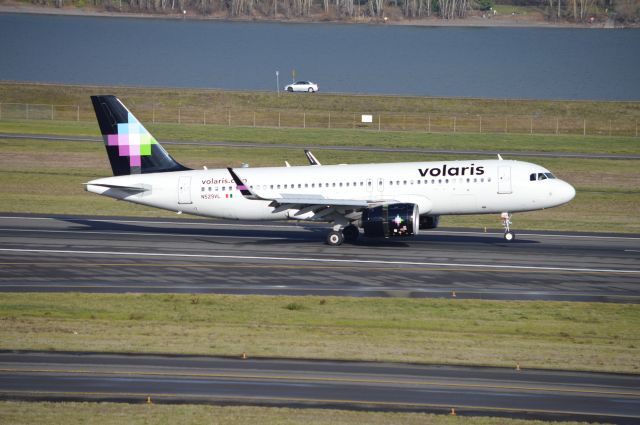 Airbus A320neo (N529VL) - VOI956 arriving on 10L from Guadalajara (MMGL/GDL). This was my first time seeing the older Volaris livery on one of their Airbus A320neos. There are only a handful of A320neos in this livery.