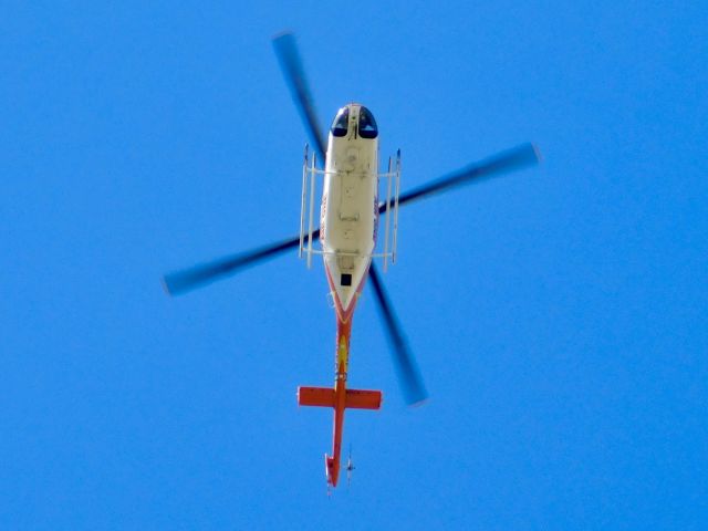 Bell 407 (N611PA) - Pafford Air One Echo flying over me at school while approaching Bolivar Medical Center 