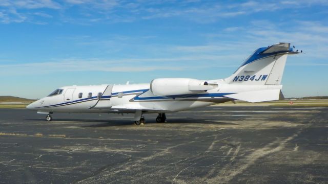 Learjet 60 (N384JW) - LJ60 sitting on the ramp outside the DPJ hangar