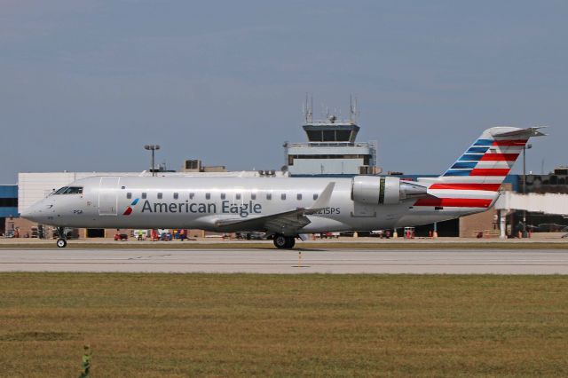 Canadair Regional Jet CRJ-200 (N215PS) - American Eagle/PSA Airlines BlueStreak (JIA) 5479 arriving from Charlotte/Douglas Intl (KCLT) on Sunday 27 Aug 2017. American Eagle, operated by PSA Airlines, began daily service (2-flights/day) between KTOL and KCLT with the inaugural flight from Toledo Express on Tuesday 22 Aug 2017. The CRJ-200ER, N215PS, c/n 7880, arrived and departed RWY 25.