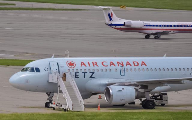 Airbus A319 (C-GBIK) - Air Canada Jetz sitting at the FBO signature ramp. June 2018