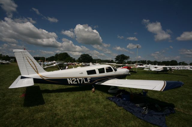 Piper Saratoga (N217LF) - See more planes from the 2013 EAA Airventure here- a rel=nofollow href=http://www.facebook.com/media/set/?set=a.10153121083865078.1073741840.283142505077&type=1https://www.facebook.com/media/set/?set=a.10153121083865078.1073741840.283142505077&type=1/a