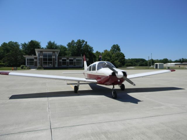 Piper Cherokee (N2515U) - 2515U on the ramp at Michigan City, IN, in support of a Pilot's N Paws transport (airdog). Bailey the bloodhound was taking a trip to Iowa.br /The staff at KMGC was top drawer. Gas was cheaper than most of the local area, and one of the line guys came out to pull the airhose out of the truck garage when I noticed my front wheel was a bit low. The FBO is well appointed and comfortable. They have lots of grass for Bailey to find happiness.