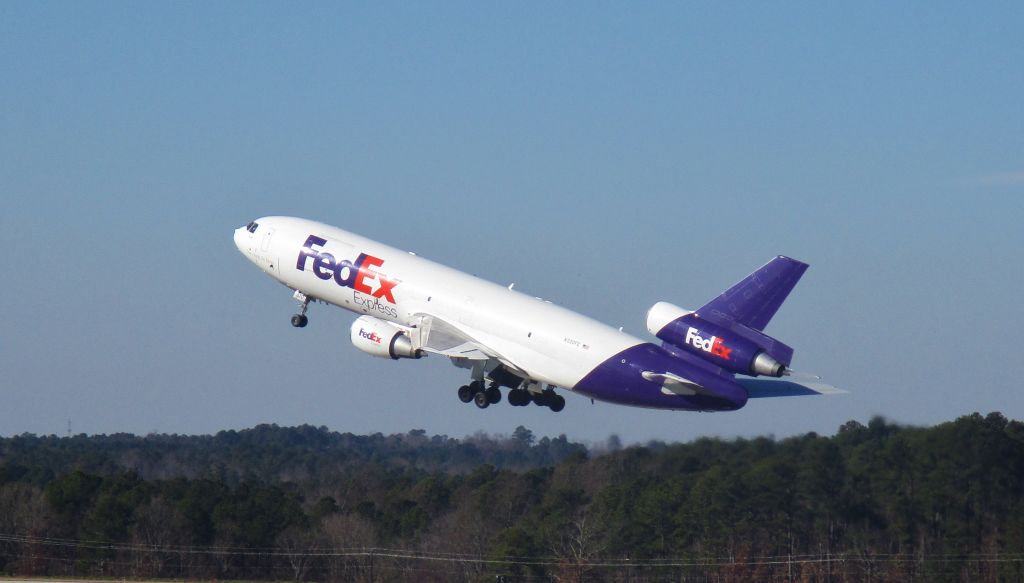 McDonnell Douglas DC-10 (N320FE) - The MD-10 makes her triumphant return to RDU for the Christmas season! Well, she was leaving - but shell be coming back.  Wonderful empty plane rotation.