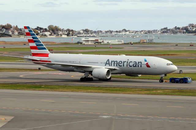 Boeing 777-200 (N771AN) - AA 109 from London being towed from the international gate to the American terminal