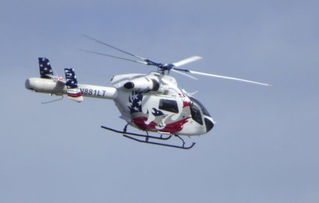 McDonnell Douglas MD-90 (N881LT) - Making a low pass is this 2006 McDonnell Douglas MD-902 Explorer Medical Helicopter in the Autumn of 2016.