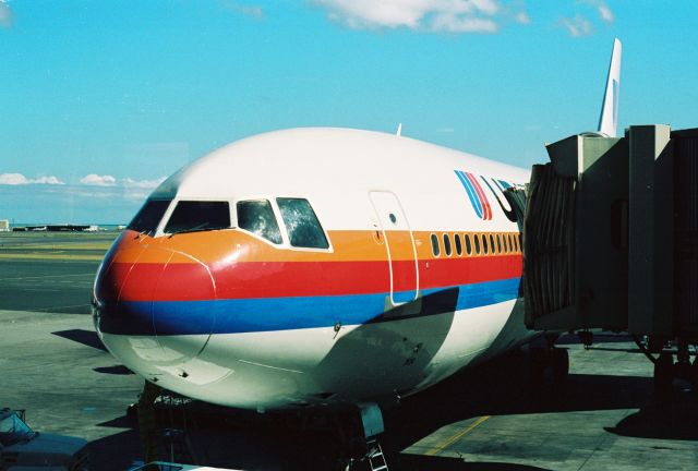 McDonnell Douglas DC-10 — - United DC-10 parked at gate at PHNL, 1990