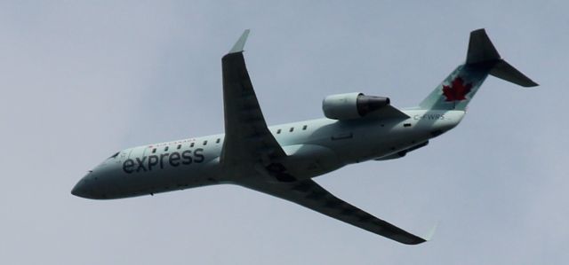 Canadair Regional Jet CRJ-200 (C-FWRS) - Flying over the Henry Ford Village retirement community in Dearborn, Michigan, approaching KDTW.