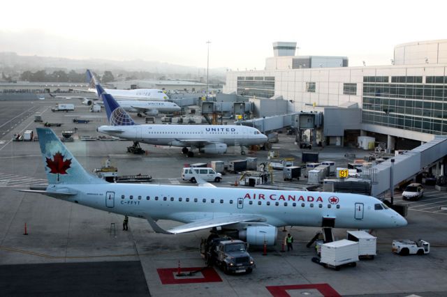 Embraer 170/175 (C-FFYT) - KSFO – Air Canada - Embraer ERJ-190 - SN 19000018 - C-FFYT - Gate-91br /               United Airlines - A319 - MSN 980 - N825UA - Gate-93br /               United Airlines - A319 - Gate-97br /               United Airlines - Boeing 747 - Gate-99