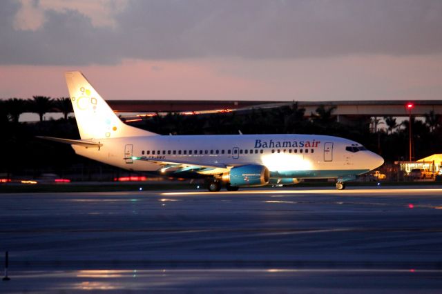 Boeing 737-500 (C6-BFC) - Lined up on 10L, 7/18/14