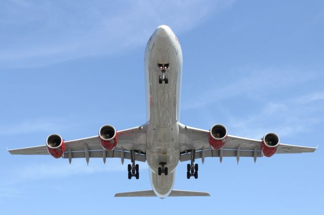 Airbus A340-600 (G-VEIL) - On approach to runway 027R at LHR.