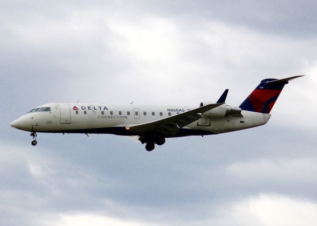 Canadair Regional Jet CRJ-200 (N868AS) - At Shreveport Regional.