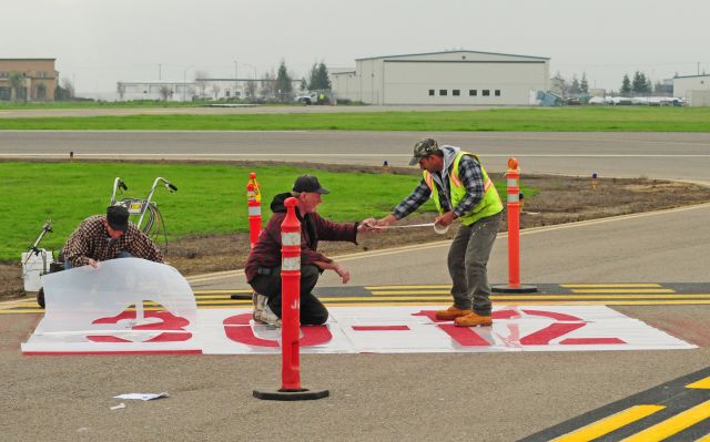 — — - Surface Painted Holding Position Sign. Denotes entrance to runway from a taxiway. Supplements elevated holding position signs