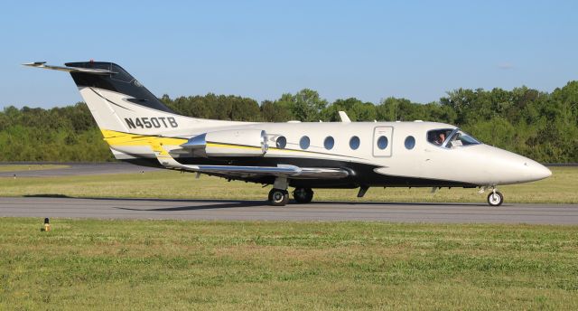 Beechcraft Beechjet (N450TB) - A 1998 model Beechcraft Beechjet 400A taxiing for departure at Boswell Field, Talladega Municipal Airport, AL, after the NASCAR GEICO 500 race at Talladega Super Speedway - late afternoon, April 25, 2021.